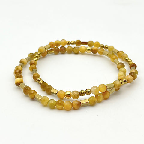 Armband-Set aus Tigerauge und goldenen Details